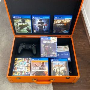 PlayStation 4 with controller and 8 games.